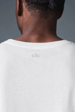 The Triumph Muscle Tank - White 9 The Triumph Muscle Tank - White -Alo Fashion Store M2033R 00 b1 s1 a4 1 m221