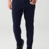 The Triumph Sweatpant - Navy 2 The Triumph Sweatpant - Navy -Alo Fashion Store M5079R 03842 b1 s3 a1 1 m108